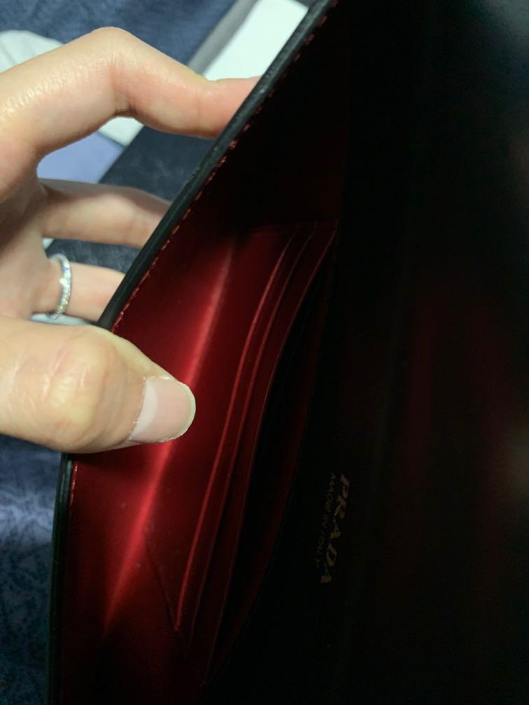 Prada (Category: Bags & Wallets) located in Singapore. Submitted by gerrilala (Listing ID 1058100821, Image 3). Description: Come with authentic cards and box 100% authentic 2 card holder slot .