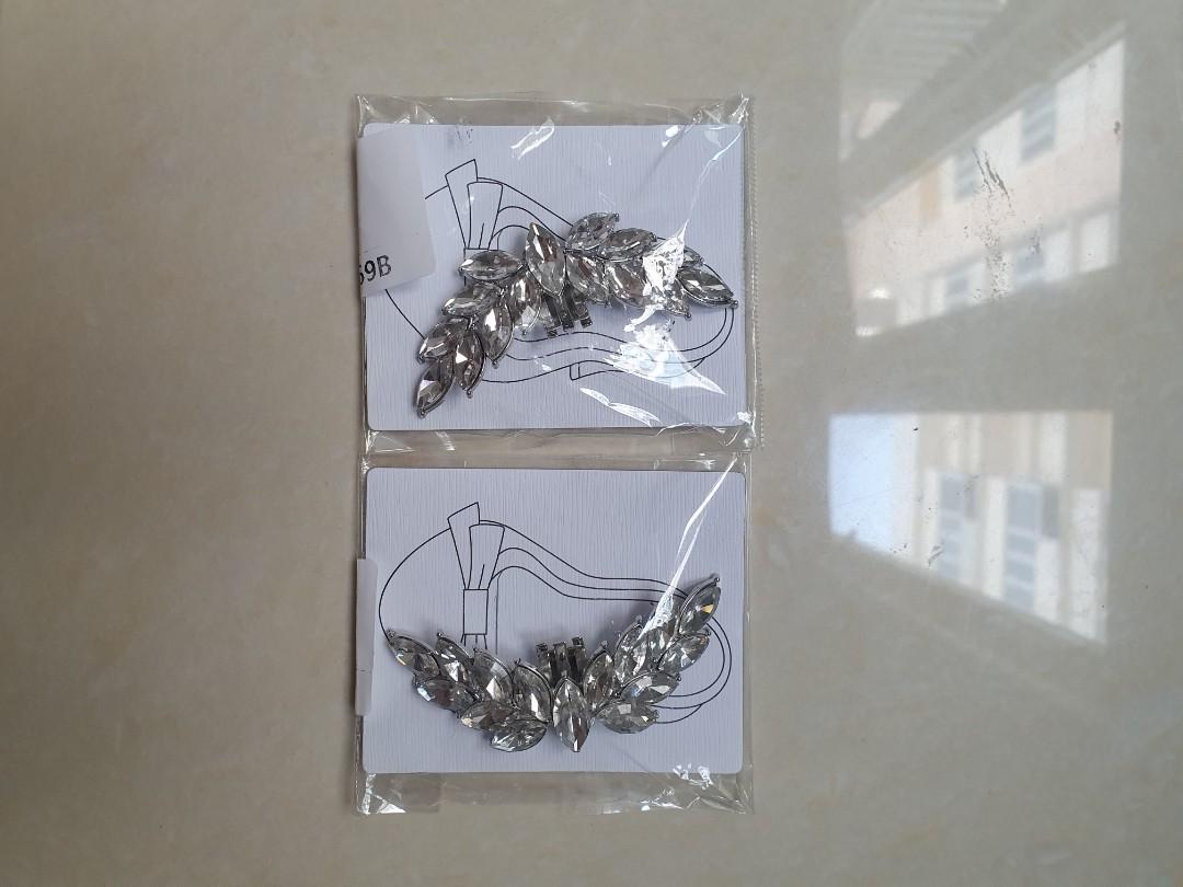 Shoe clip rhinestone crystal silver wings pair (Category: Sneakers) located in Taguig. Submitted by arkfinder (Listing ID 1057993046, Image 3). Description: - instantly add glamour to your shoes by clipping this on - New; bought for wedding shoes but decided to use another one - bought for 200 pesos per piece, selling for 199 a pair - size: 6.5x2.3cm(2.56x0.91in) - shoes in picture not included.