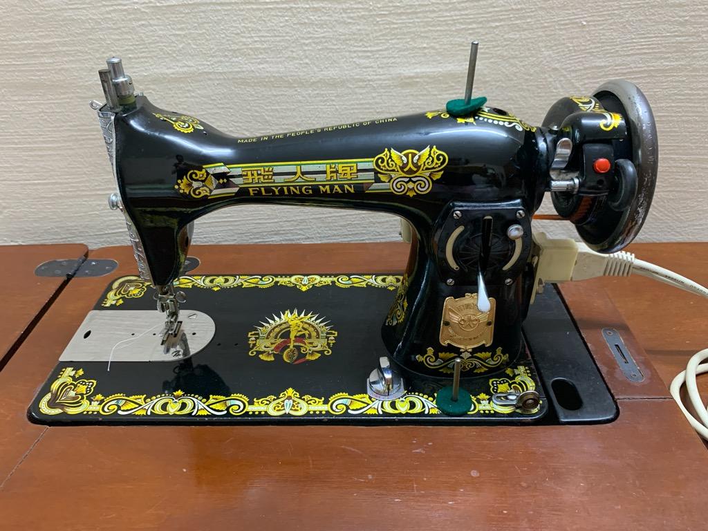 Flying man sewing machine, Hobbies & Toys, Memorabilia & Collectibles