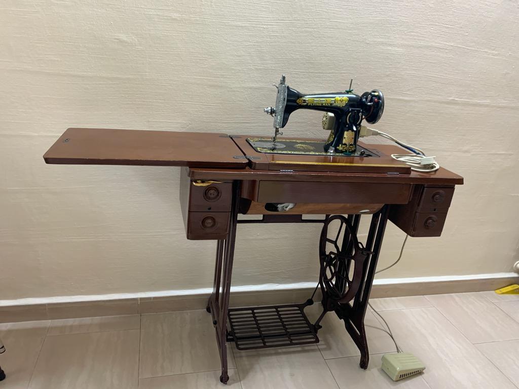 Flying man sewing machine, Hobbies & Toys, Memorabilia & Collectibles