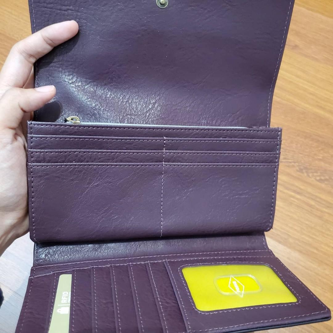 Logan flap sales clutch fossil