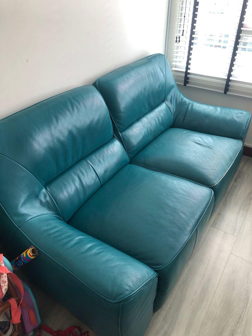 Teal store leather couch