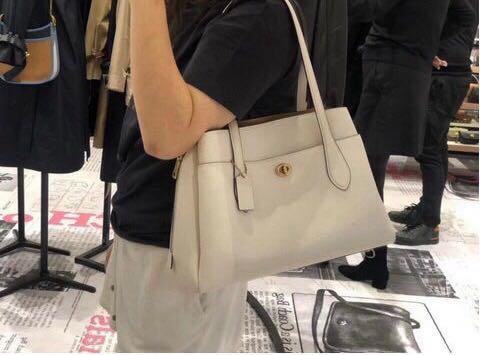 Authentic coach Lora carryall 91740 in white Luxury Bags Wallets on Carousell