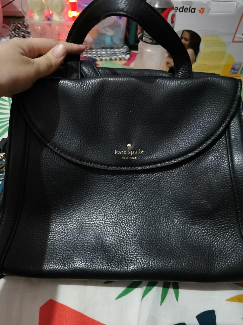 Authentic Kate Spade Cobble Hill Adrien Large Satchel (Category: Purses & Pouches) located in Quezon City. Submitted by professional.declutterer (Listing ID 1058698640, Image 2). Description: Authentic Kate Spade Cobble Hill Adrien Large Black Satchel bought from Australia 2 way crossbody with top handles, magnetic snap closure and detachable shoulder strap perfect for office/casual use with care card with light scratch in front with signs of usa