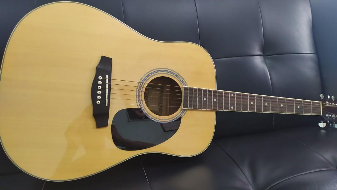 J D acoustic guitar