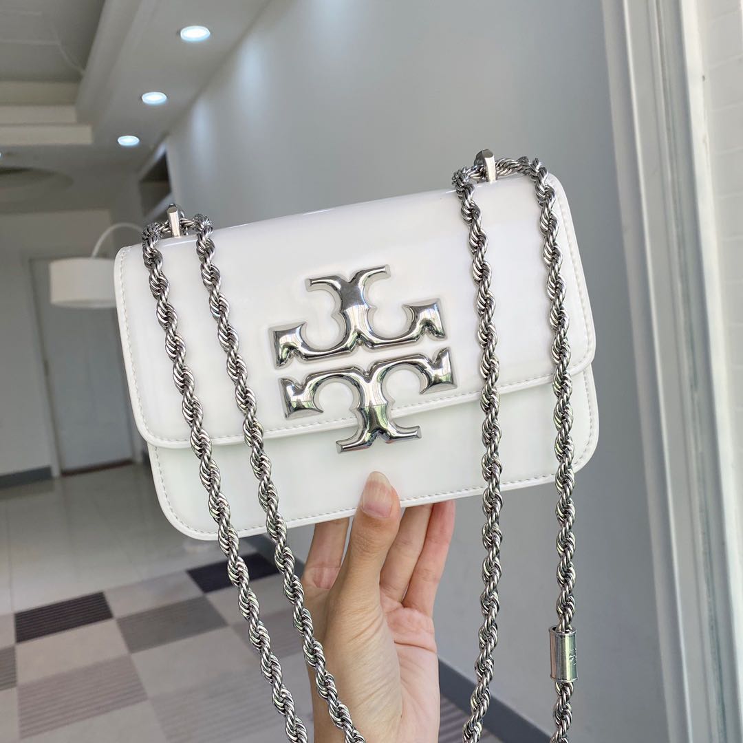 Tory Burch Eleanor White Silver Logo Small, Women's Fashion, Bags &  Wallets, Purses & Pouches on Carousell