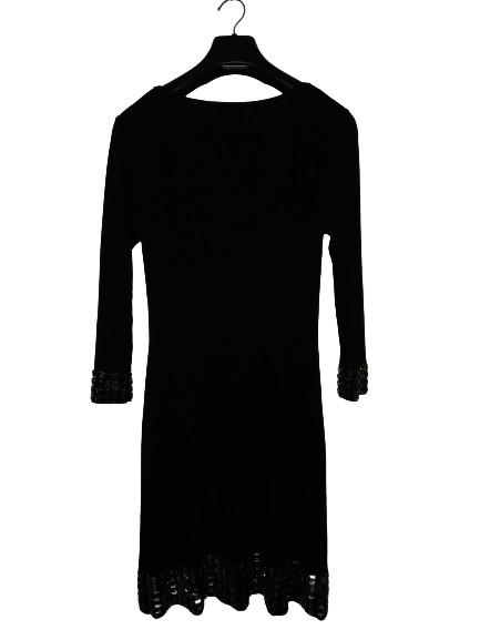 BCBG Maxazria Black Party Dress with Cuff and Hem trims, Large (Category: Evening dresses & gowns) located in Quezon City. Submitted by kaitstell (Listing ID 1058731510, Image 2). Description: Preloved but like new. Brand: BCBG Maxazria Size: Large color: Black with silver trims Elegant party dress.