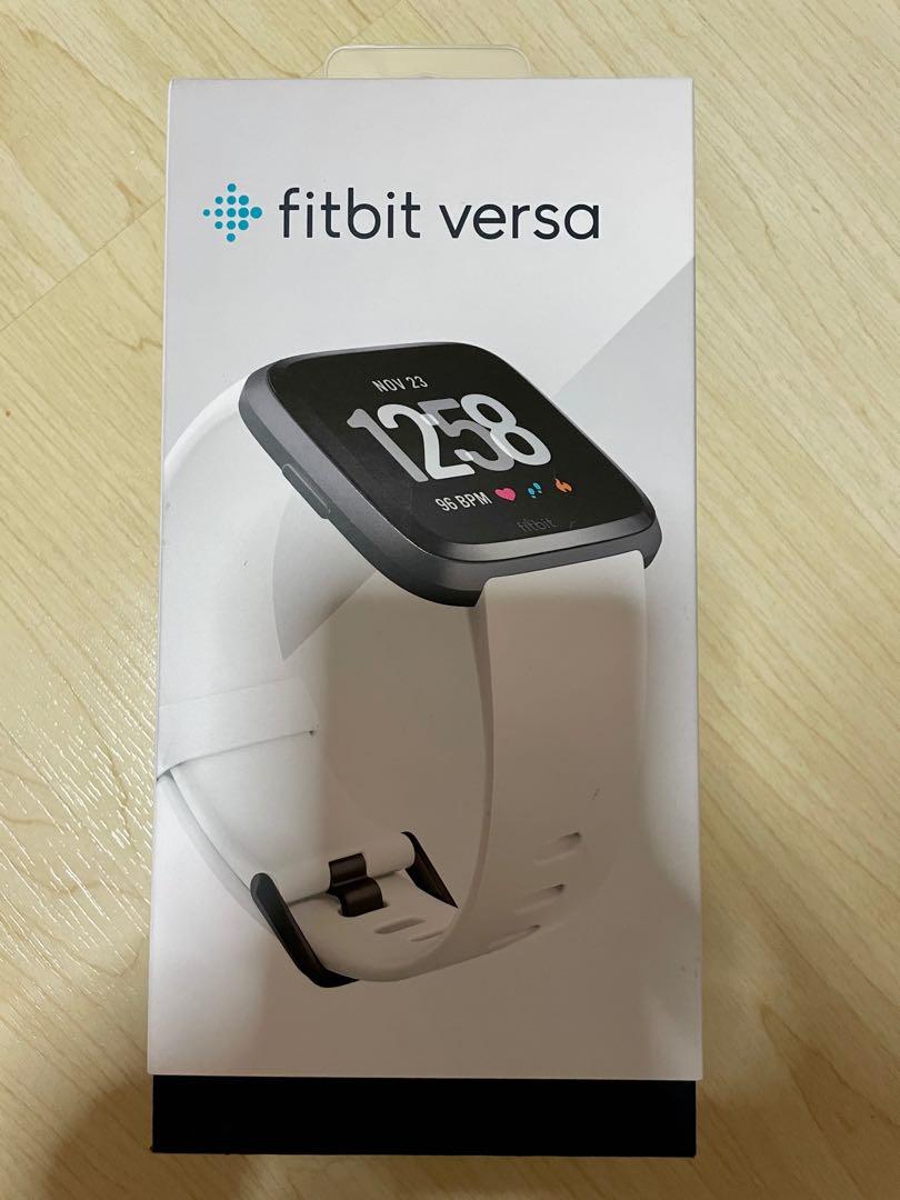 Black fitbit versa with white band store
