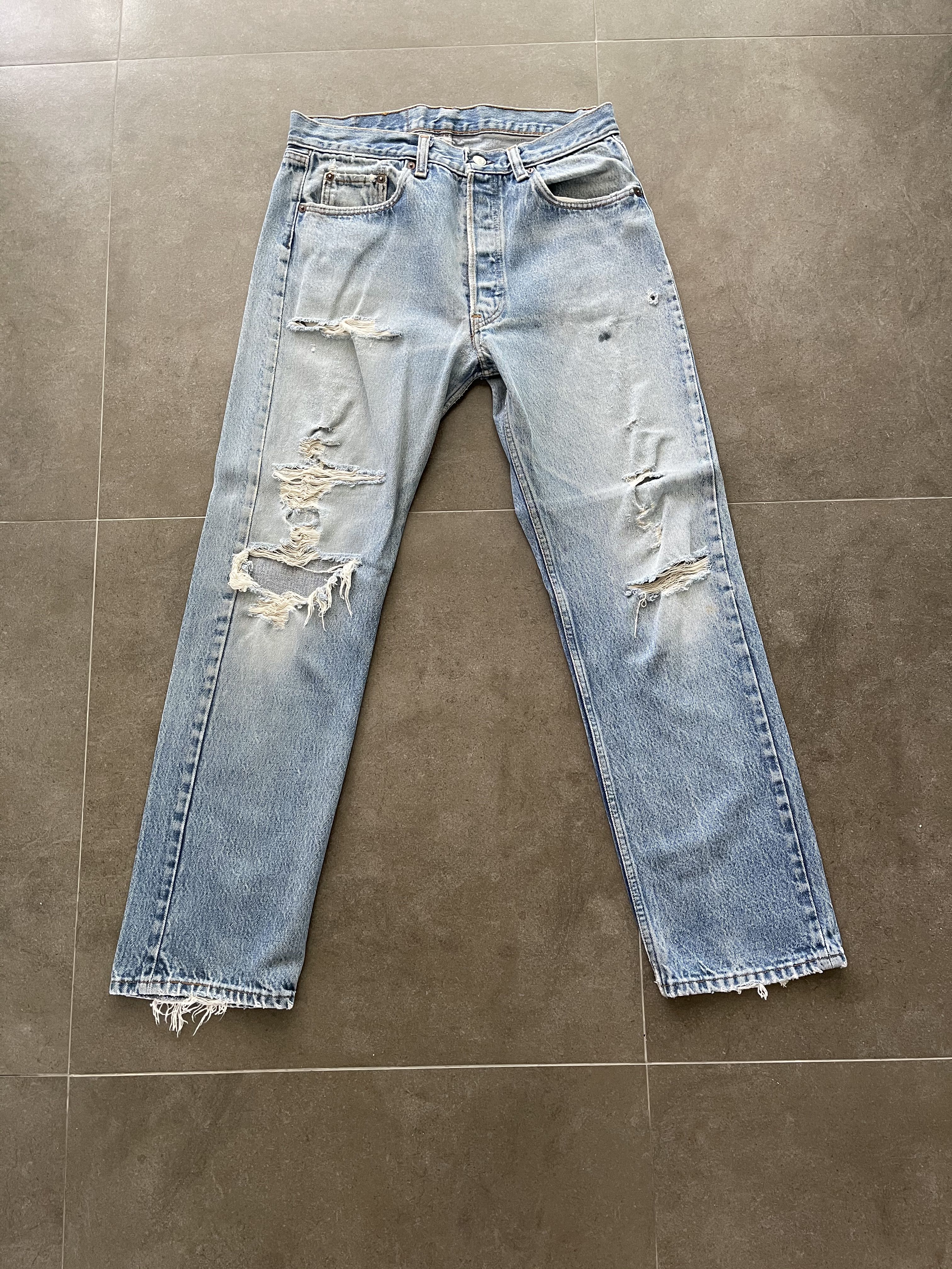 Vintage light blue distressed Levi's denim jeans, Men's Fashion, Bottoms,  Jeans on Carousell