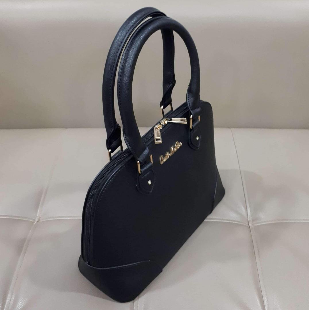 Cecil McBee Alma Type (Category: Luxury Bags & Wallets) located in Taguig. Submitted by esa.agustin (Listing ID 1059239494, Image 2). Description: Original Cecil McBee saffiano leatner alma type bag. Size 30 cm. In very good condition..