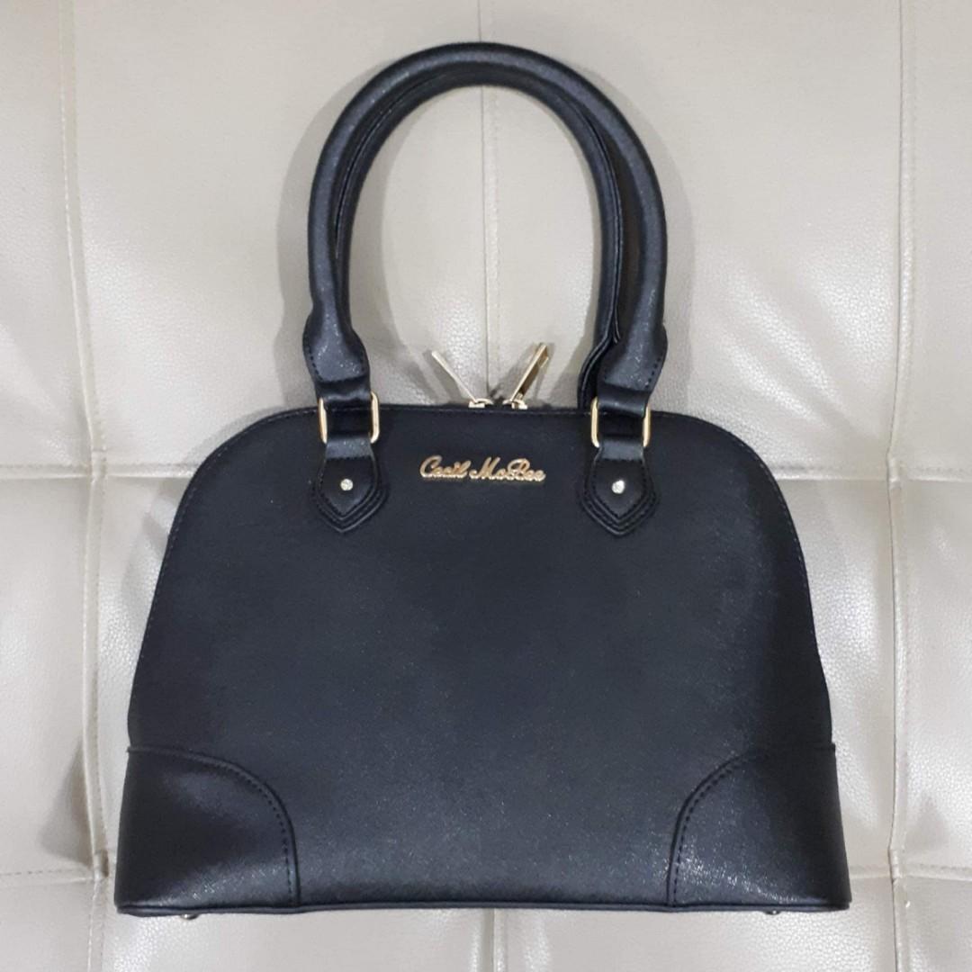 Cecil McBee Alma Type (Category: Luxury Bags & Wallets) located in Taguig. Submitted by esa.agustin (Listing ID 1059239494, Image 1). Description: Original Cecil McBee saffiano leatner alma type bag. Size 30 cm. In very good condition..