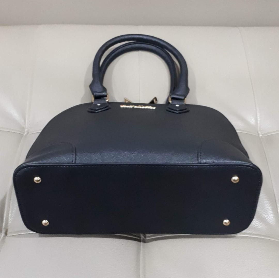 Cecil McBee Alma Type (Category: Luxury Bags & Wallets) located in Taguig. Submitted by esa.agustin (Listing ID 1059239494, Image 3). Description: Original Cecil McBee saffiano leatner alma type bag. Size 30 cm. In very good condition..