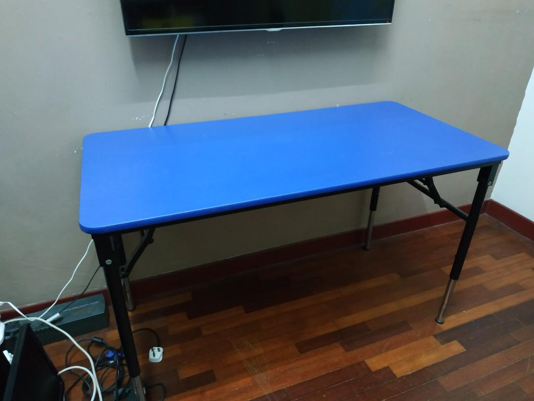 Adjustable study table (Category: Tables & Sets) located in Kuala Lumpur. Submitted by song98 (Listing ID 1053427674, Image 1). Description: Condition: 9/10 L x W: 47.5 x 23.5 inches H: 20.5 - 29 inches (adjustable) Adjustable Height & Foldable Legs: Adjustable height fr standard height (adult sitting level) to pre-school table height (kid's seating level) Good quality - Sturdy & heavy. Extra solid stainless steel legs. Original price: RM320.