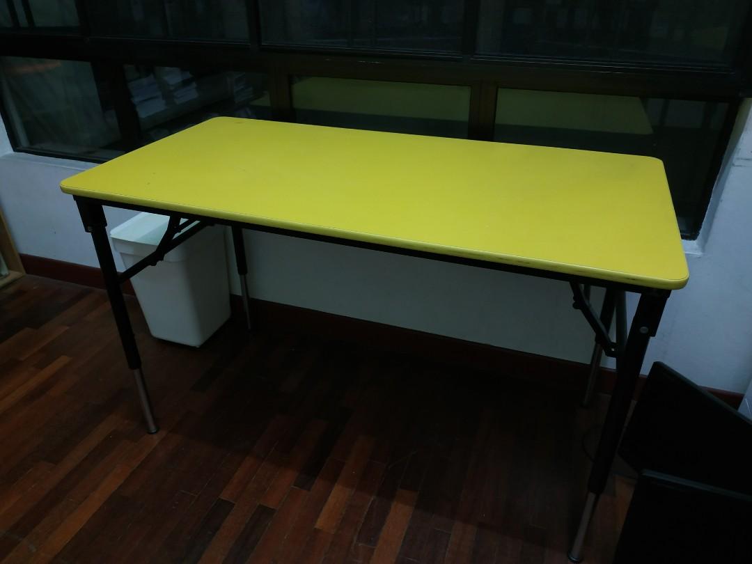 Adjustable study table (Category: Tables & Sets) located in Kuala Lumpur. Submitted by song98 (Listing ID 1053427674, Image 2). Description: Condition: 9/10 L x W: 47.5 x 23.5 inches H: 20.5 - 29 inches (adjustable) Adjustable Height & Foldable Legs: Adjustable height fr standard height (adult sitting level) to pre-school table height (kid's seating level) Good quality - Sturdy & heavy. Extra solid stainless steel legs. Original price: RM320.