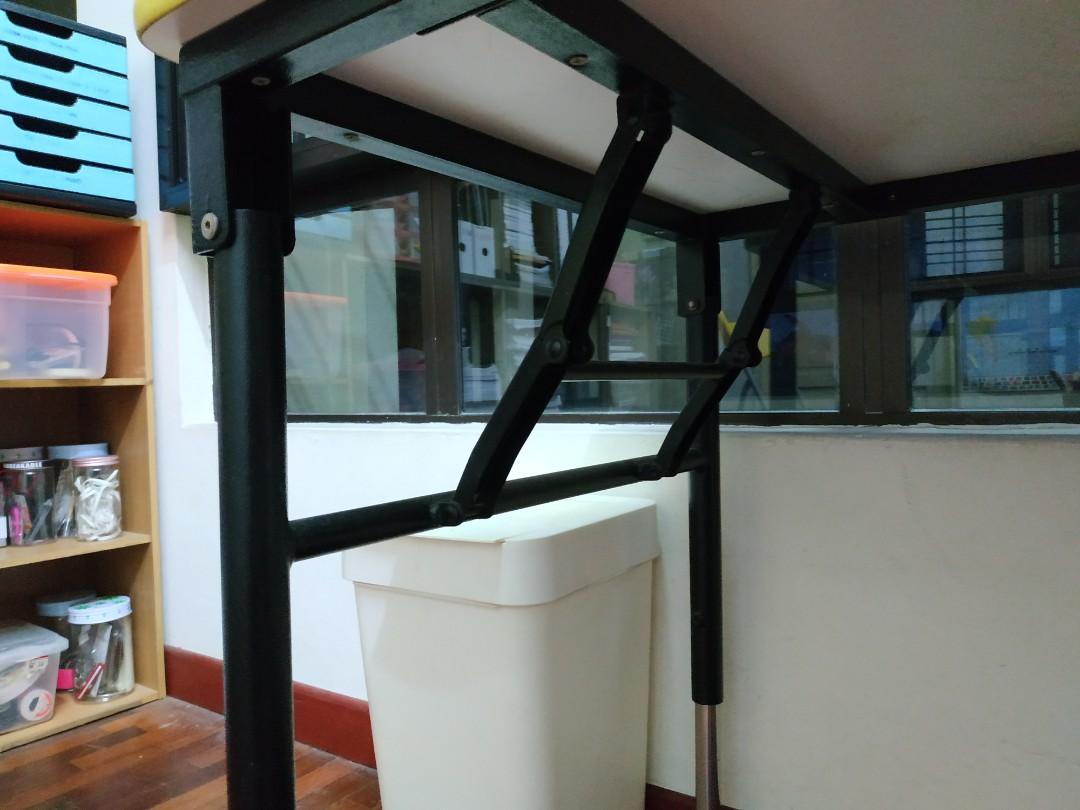 Adjustable study table (Category: Tables & Sets) located in Kuala Lumpur. Submitted by song98 (Listing ID 1053427674, Image 3). Description: Condition: 9/10 L x W: 47.5 x 23.5 inches H: 20.5 - 29 inches (adjustable) Adjustable Height & Foldable Legs: Adjustable height fr standard height (adult sitting level) to pre-school table height (kid's seating level) Good quality - Sturdy & heavy. Extra solid stainless steel legs. Original price: RM320.