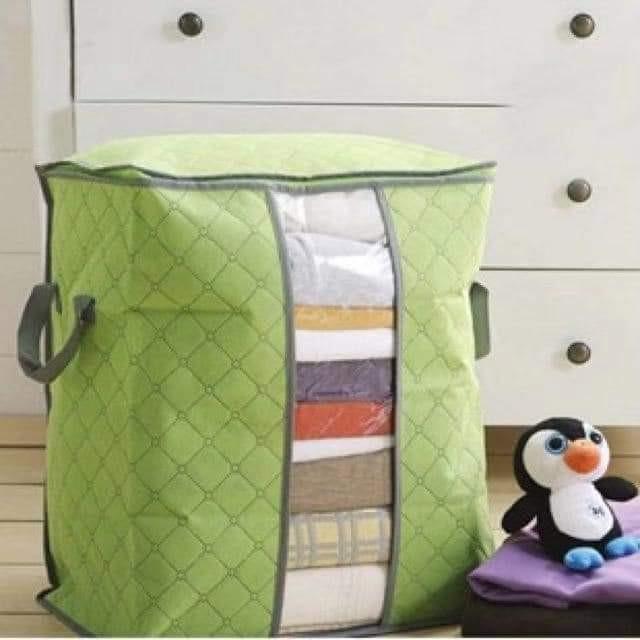 Foldable Blanket-Type Clothes Storage Organizer (Category: Storage Boxes & Baskets) located in Manila. Submitted by acinad_ (Listing ID 1053292998, Image 1). Description: Foldable Blanket-Type Clothes Storage Organizer For shipping: - Grab Delivery - LalaMove - Angkas Message for inquiries!.
