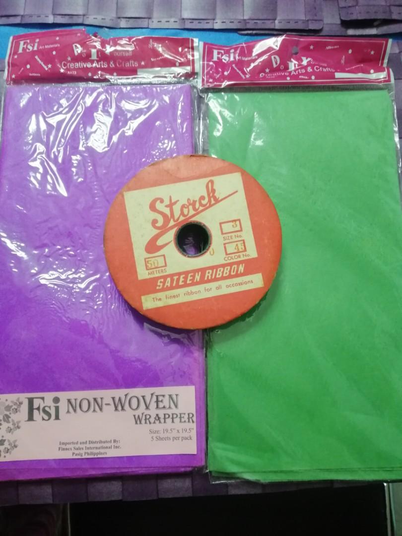 Ribbon and Non Woven wrapper (Category: Craft Supplies & Tools) located in Paranaque City. Submitted by cling20 (Listing ID 1053320757, Image 1). Description: Not used Only stored in the cabinet.
