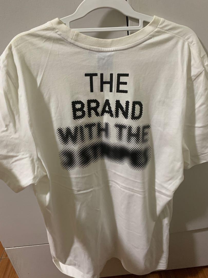 the brand with the three stripes shirt