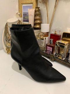 Black pointed toe booties