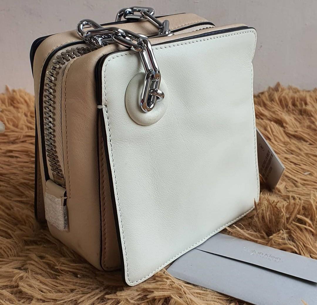 Calvin Klein Platinum white and beige mini Women s Fashion Bags Wallets Purses Pouches on Carousell