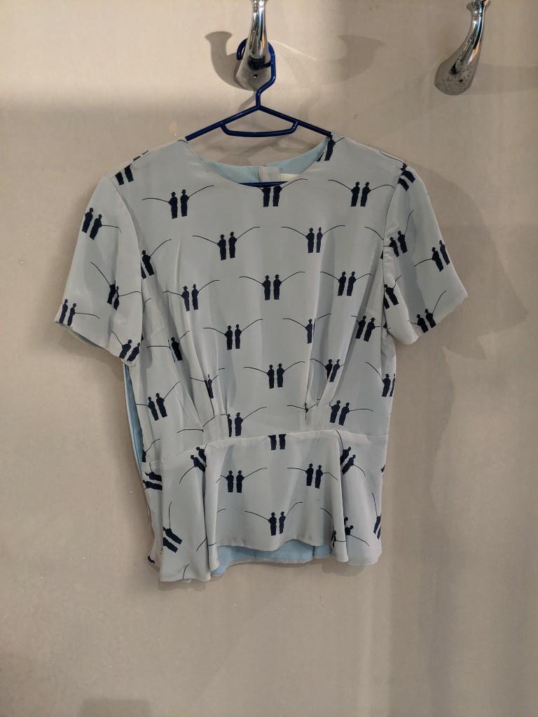 light blue peplum top