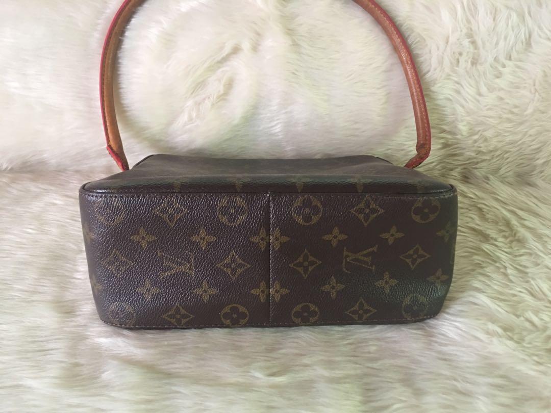 LV Monogram Canvas Looping MM (Category: Luxury Bags & Wallets) located in Tuguegarao City. Submitted by prelovedbykhelria (Listing ID 1053820974, Image 3). Description: with code, self authentication is highly recommended In very good condition for its age. Unused for years Clean interior Exterior canvas in excellent condition Handle has little darkening at bottom. 100% fully functional Super nice in actual 9.5"L x 4"W x 8.25"H *flaws: handle is