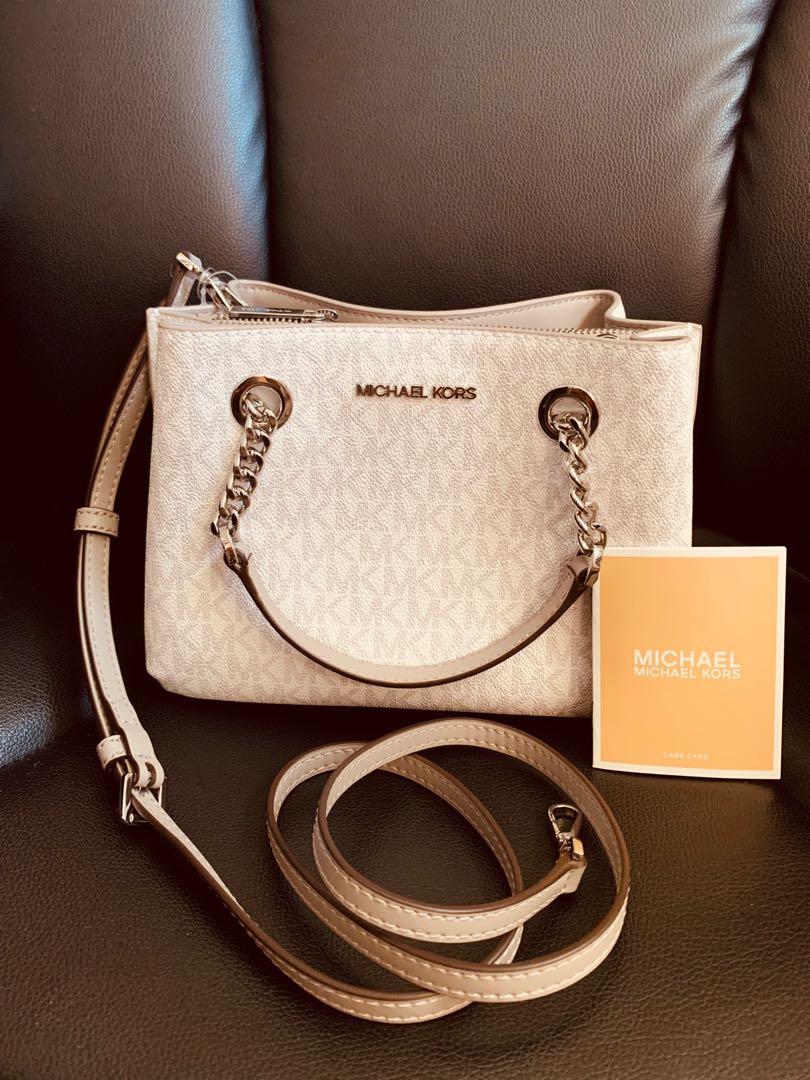 teagen small pebbled leather messenger bolsa