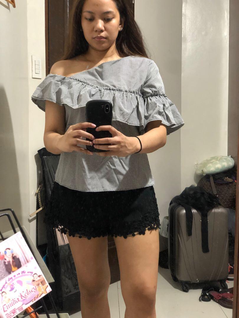 One shoulder gray top with unique style (Category: Sleeveless) located in Paranaque City. Submitted by msdeclutterph (Listing ID 1053975411, Image 1). Description: - Used once only - Perfect to “Tita” gatherings .