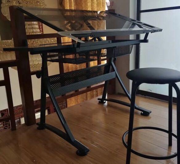 Tempered Glass Drafting Table (Category: Tables & Sets) located in San Pedro. Submitted by draftingtablemaker (Listing ID 1053870678, Image 2). Description: Tempered Glass Drafting Table Imported Unit readily available- limited unit can tilt from flat to 60 degrees free chair.