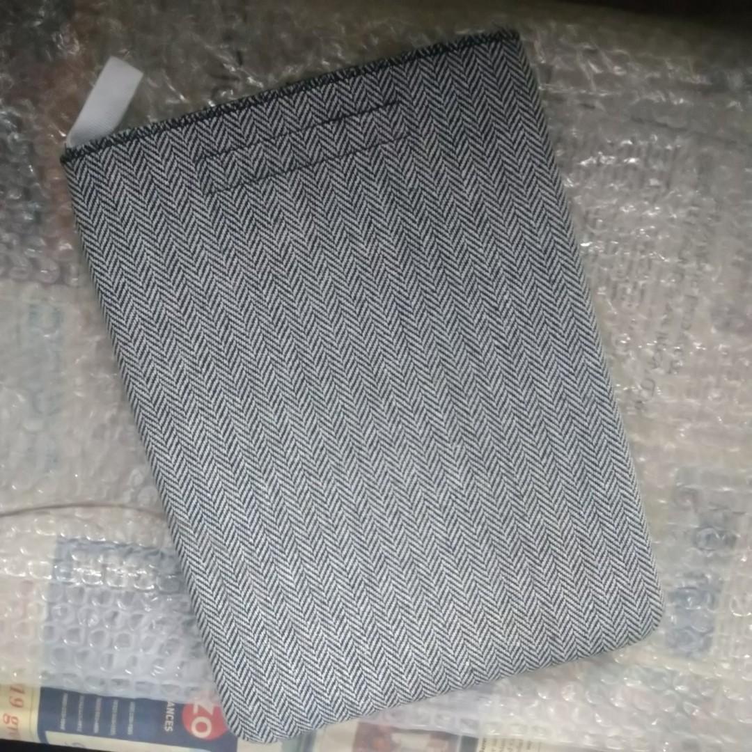 iPad / Tablet Sleeve (Category: Laptop Bags & Sleeves) located in Quezon City. Submitted by curatedbygel (Listing ID 1053983473, Image 1). Description: Bought and never used Nakatambak lang Too big for iPad Air 2 Will measure later.