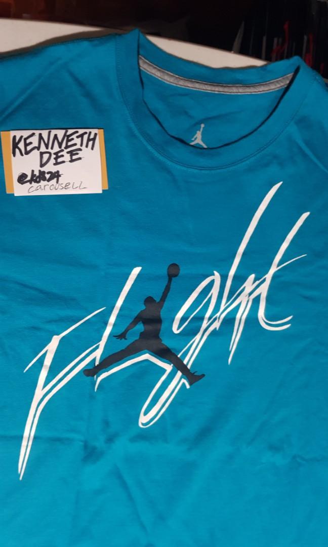 black and teal nike shirt