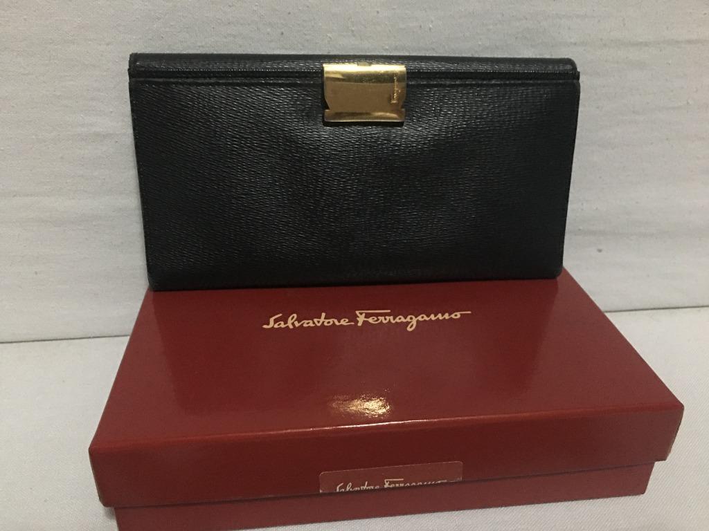 Salvatore Ferragamo Long Flap wallet (Category: Luxury Bags & Wallets) located in Quezon City. Submitted by limebasil (Listing ID 1054327704, Image 2). Description: Brand: Salvatore Ferragamo Guaranteed Authentic item or money back. Material: Leather Condition: 8/10; With light scuffing on the side and hardware 6 card slots; 2 inner pockets; 1 outer pocket for bills or coins Comes with box and card .