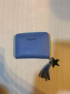 Zip wallet with tussle