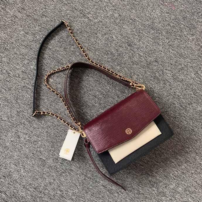 Tory burch robinson mixed material shop