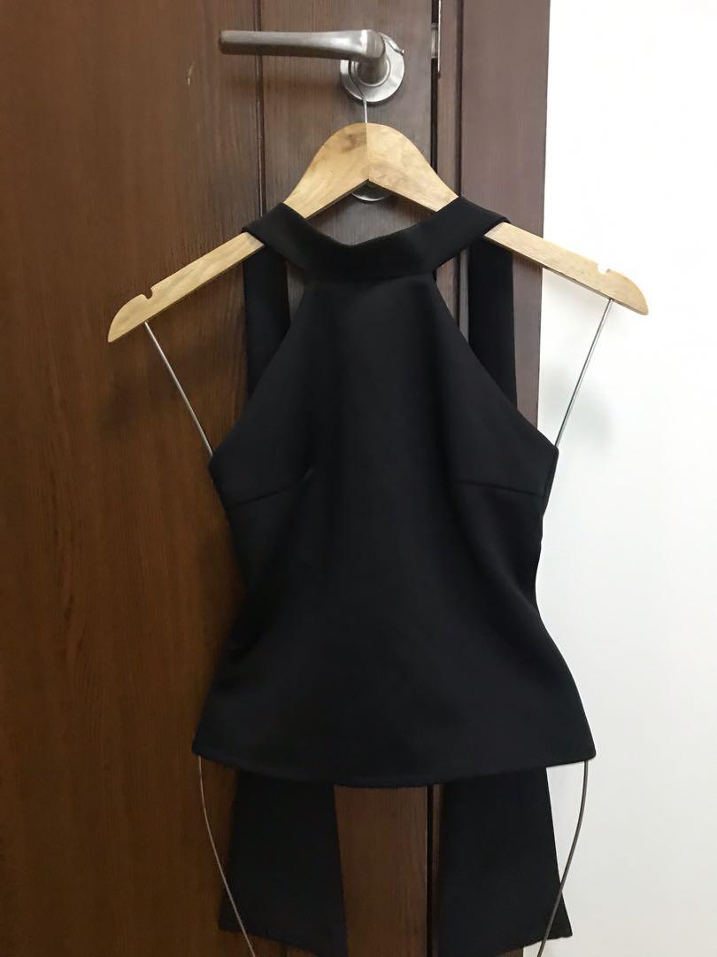 Apartment Eight : Black Halter (Category: Traditional & Ethnic wear) located in Pasig City. Submitted by tinystories (Listing ID 1054769808, Image 2). Description: Helping my loved items find new homes. Cute black halter top, can be left tied or untied at the back. Fits an XS or S frame, great to dress up any outfit. Word only once, the condition is still almost new. Now selling for just P500. RFS: decluttering personal items. Mode of Payment : v