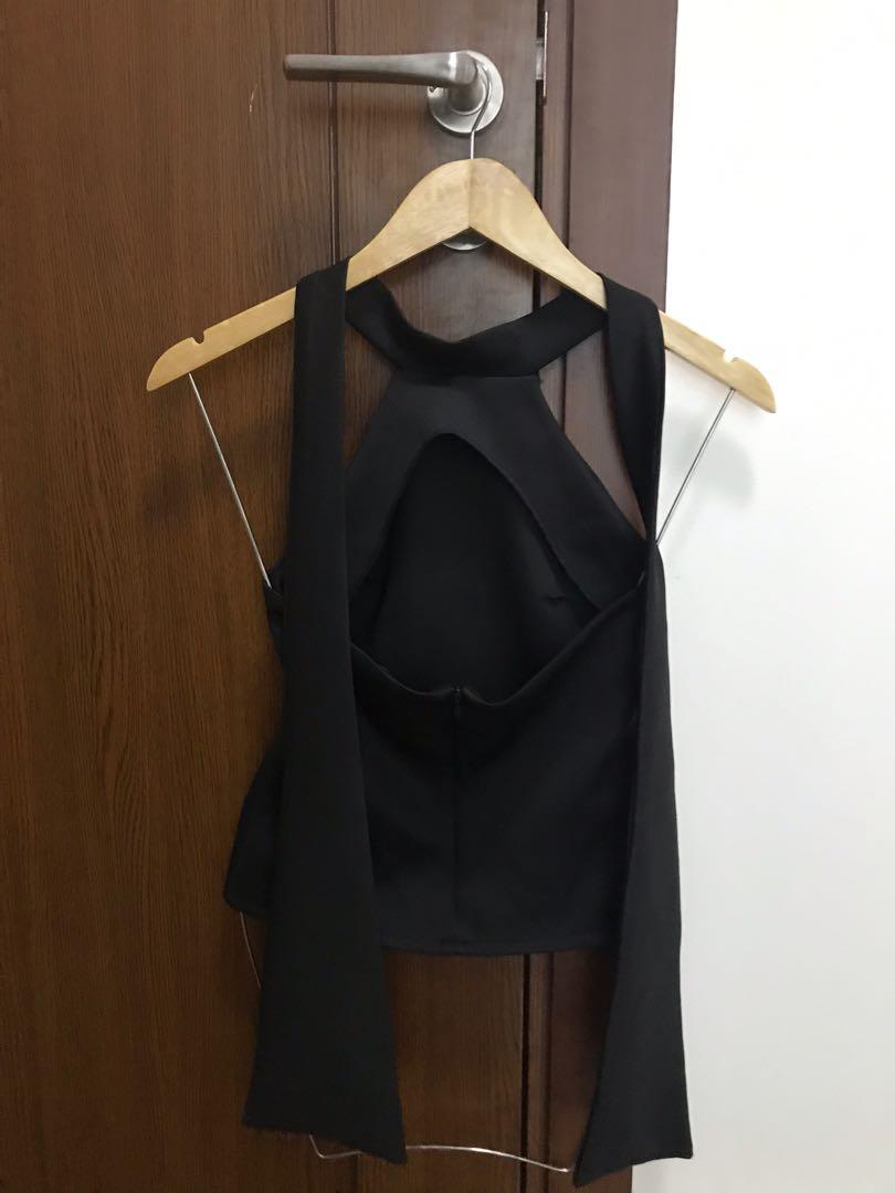 Apartment Eight : Black Halter (Category: Traditional & Ethnic wear) located in Pasig City. Submitted by tinystories (Listing ID 1054769808, Image 3). Description: Helping my loved items find new homes. Cute black halter top, can be left tied or untied at the back. Fits an XS or S frame, great to dress up any outfit. Word only once, the condition is still almost new. Now selling for just P500. RFS: decluttering personal items. Mode of Payment : v