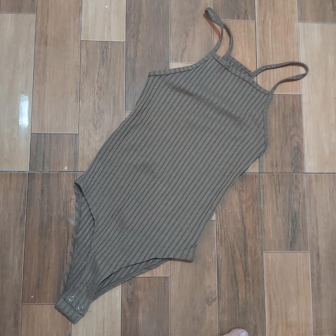 Brown body suit (Category: Rash guard) located in Quezon City. Submitted by cheverloo (Listing ID 1054715394, Image 1). Description: xs-s msyado ng maliit sakin..🤣😅.