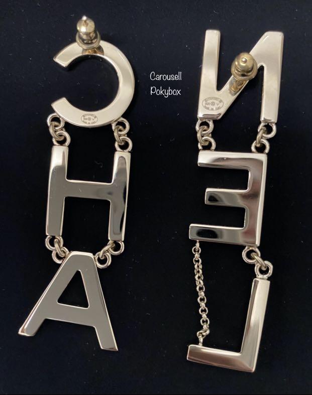 Chanel letter earrings price online