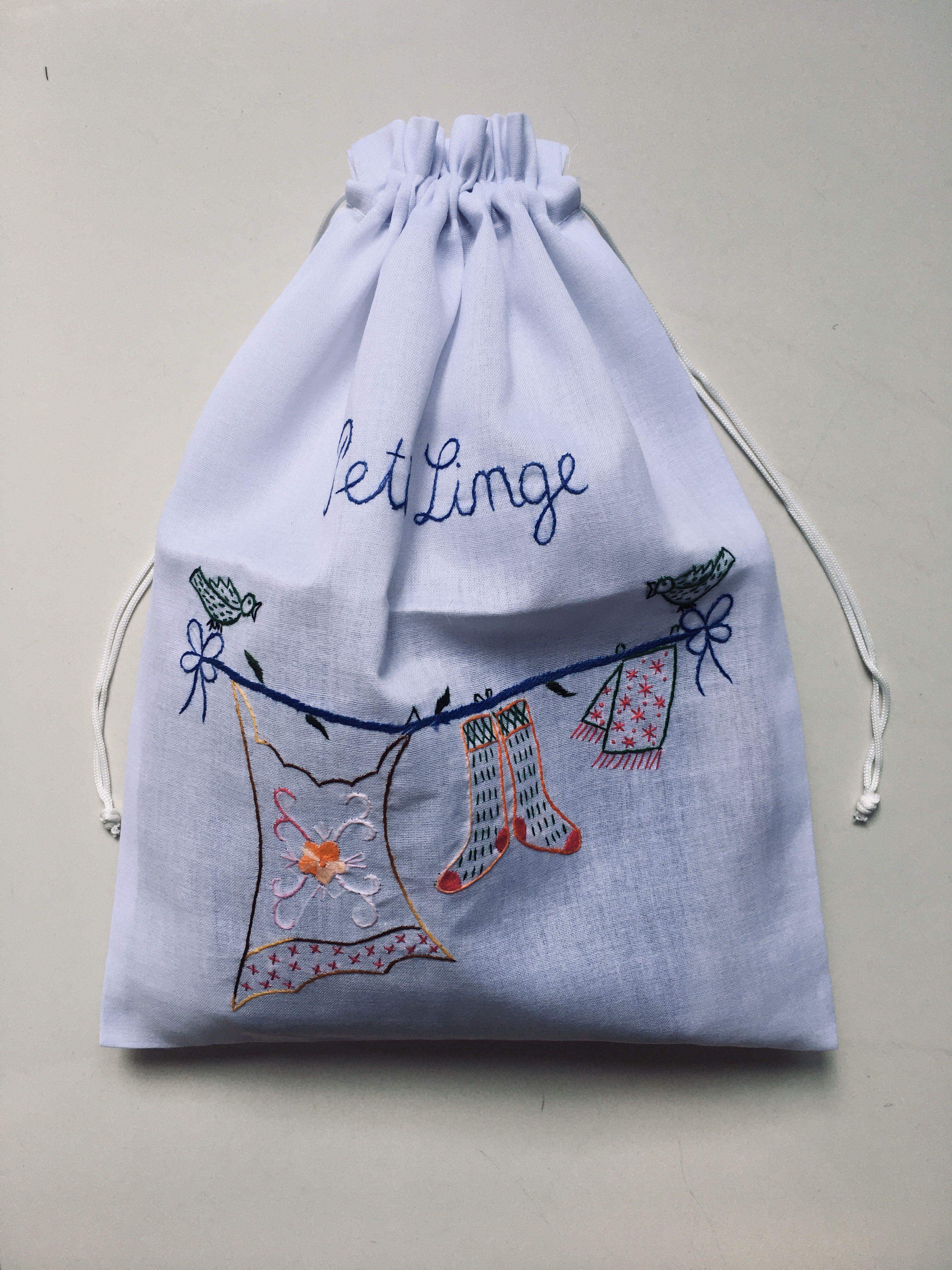 Embroidered drawstring on sale bag
