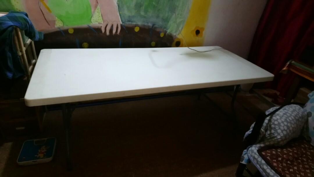 Folding Plastic Long White Table with free small drawer cabinet (Category: Tables & Sets) located in Muntinlupa City. Submitted by jemmypags (Listing ID 277502788, Image 1). Description: Good as new, sturdy and very wide (may few scratches sa gilid) Good for party or long table for dining area. 78 length 35 width 29 height in inches 8-10 people Pick up only Check out my other clothes and bags in my listing! 💕 free small green drawer cabinet (ver