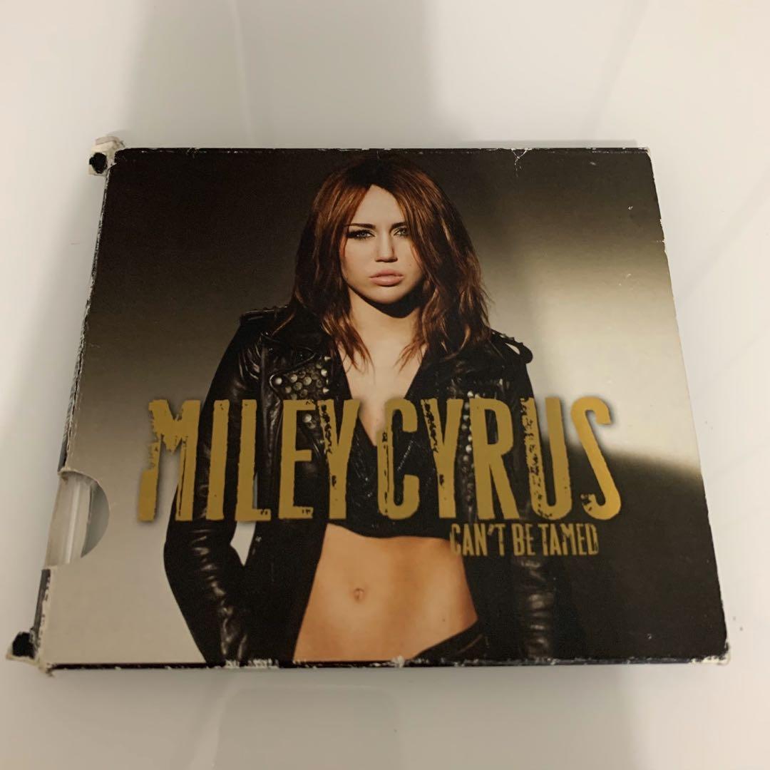 miley cyrus cant be tamed album cover