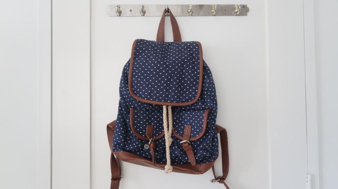 Drawstring backpack (Category: Backpacks) located in Quezon City. Submitted by estille (Listing ID 1000248558, Image 1). Description: polkadot backpack see pics for scratches.