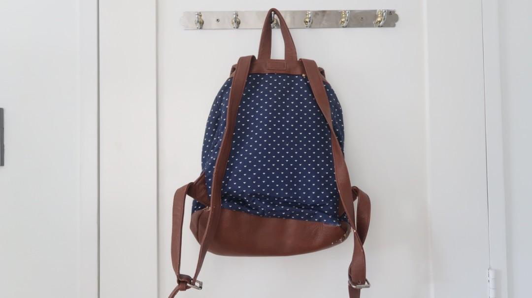 Drawstring backpack (Category: Backpacks) located in Quezon City. Submitted by estille (Listing ID 1000248558, Image 2). Description: polkadot backpack see pics for scratches.