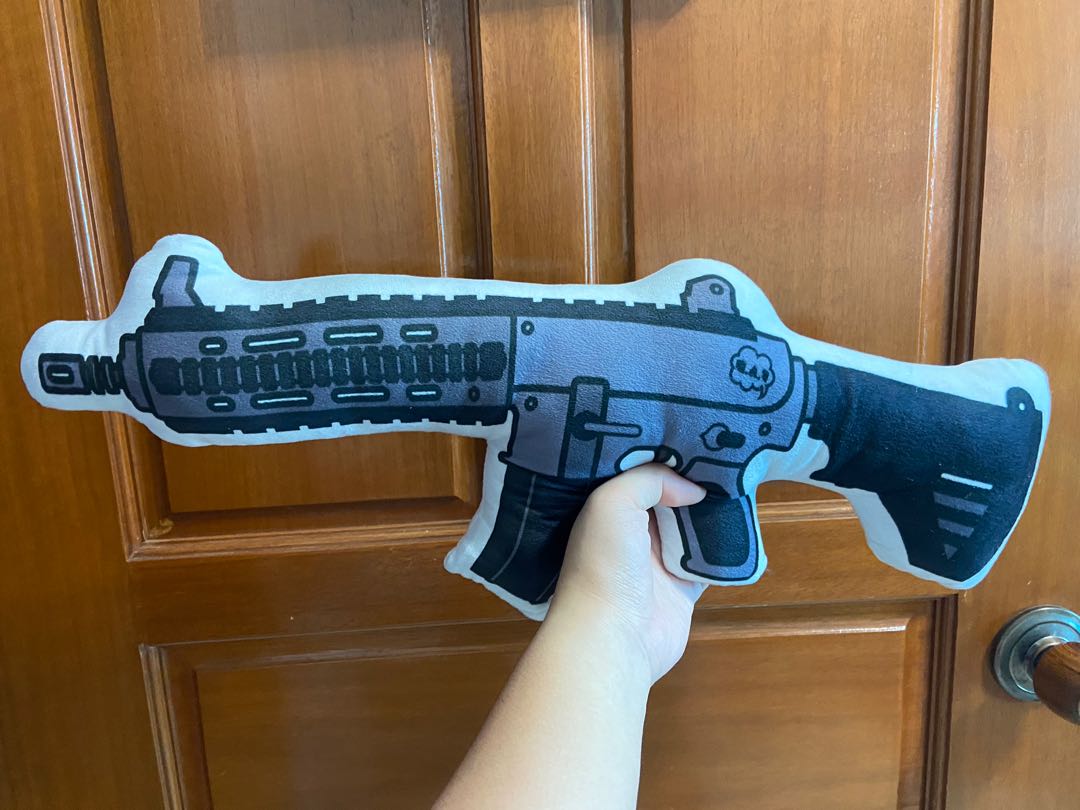 Machine gun plush toy, Hobbies & Toys, Toys & Games on Carousell