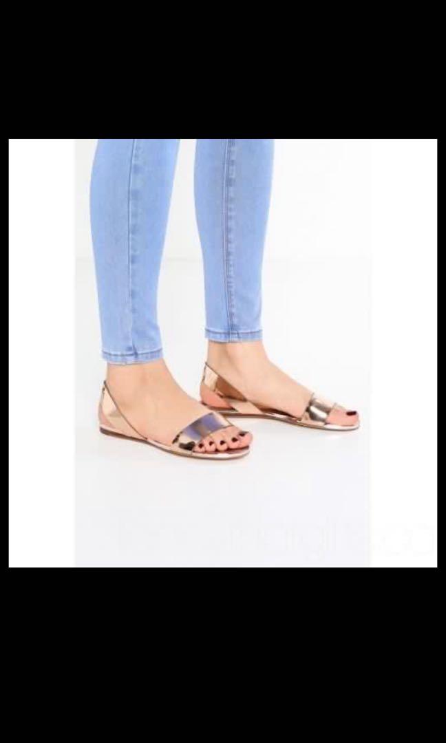 Aldo rose hotsell gold flat sandals