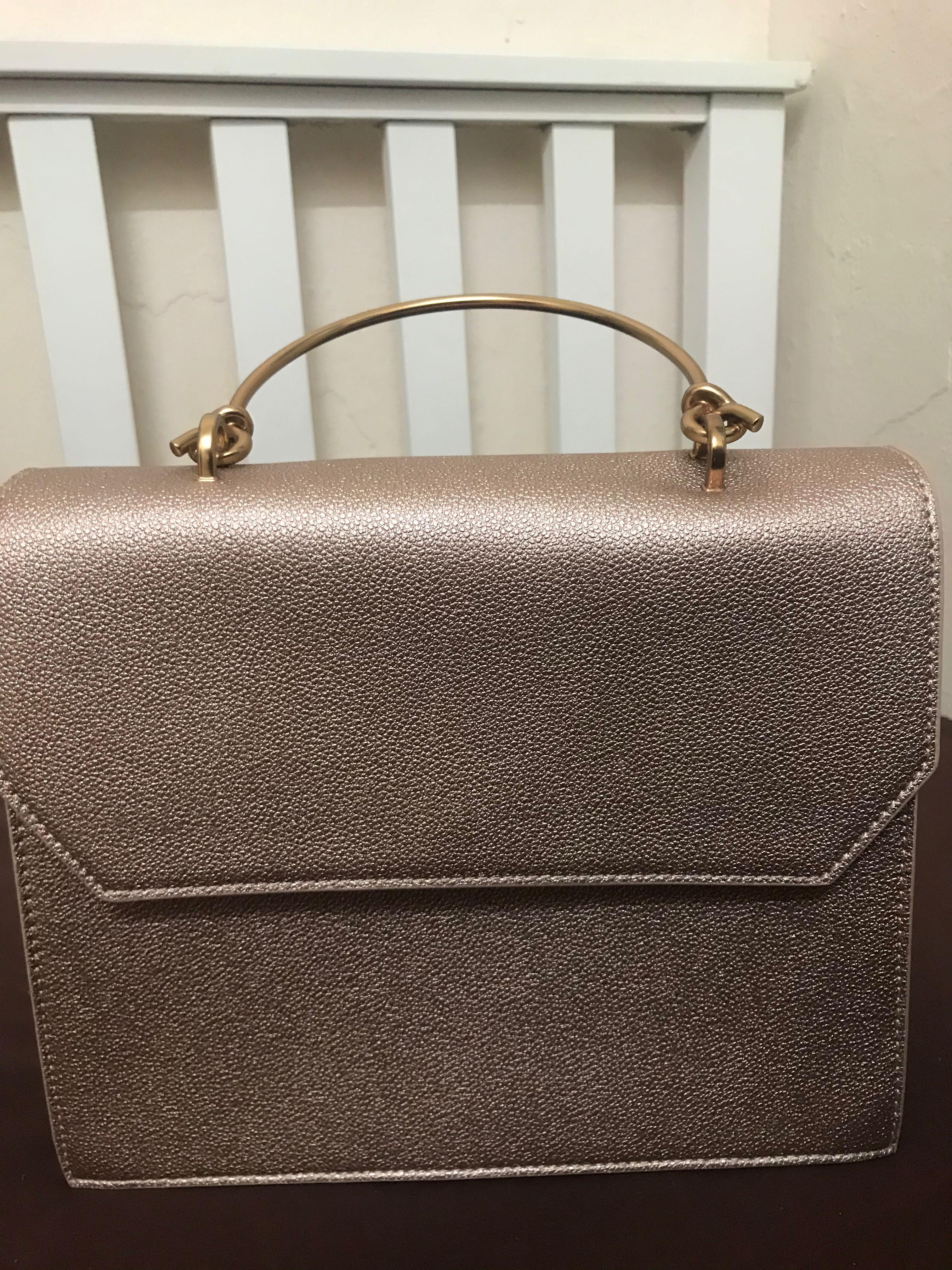 Rose Gold Charles Keith bag with long strap