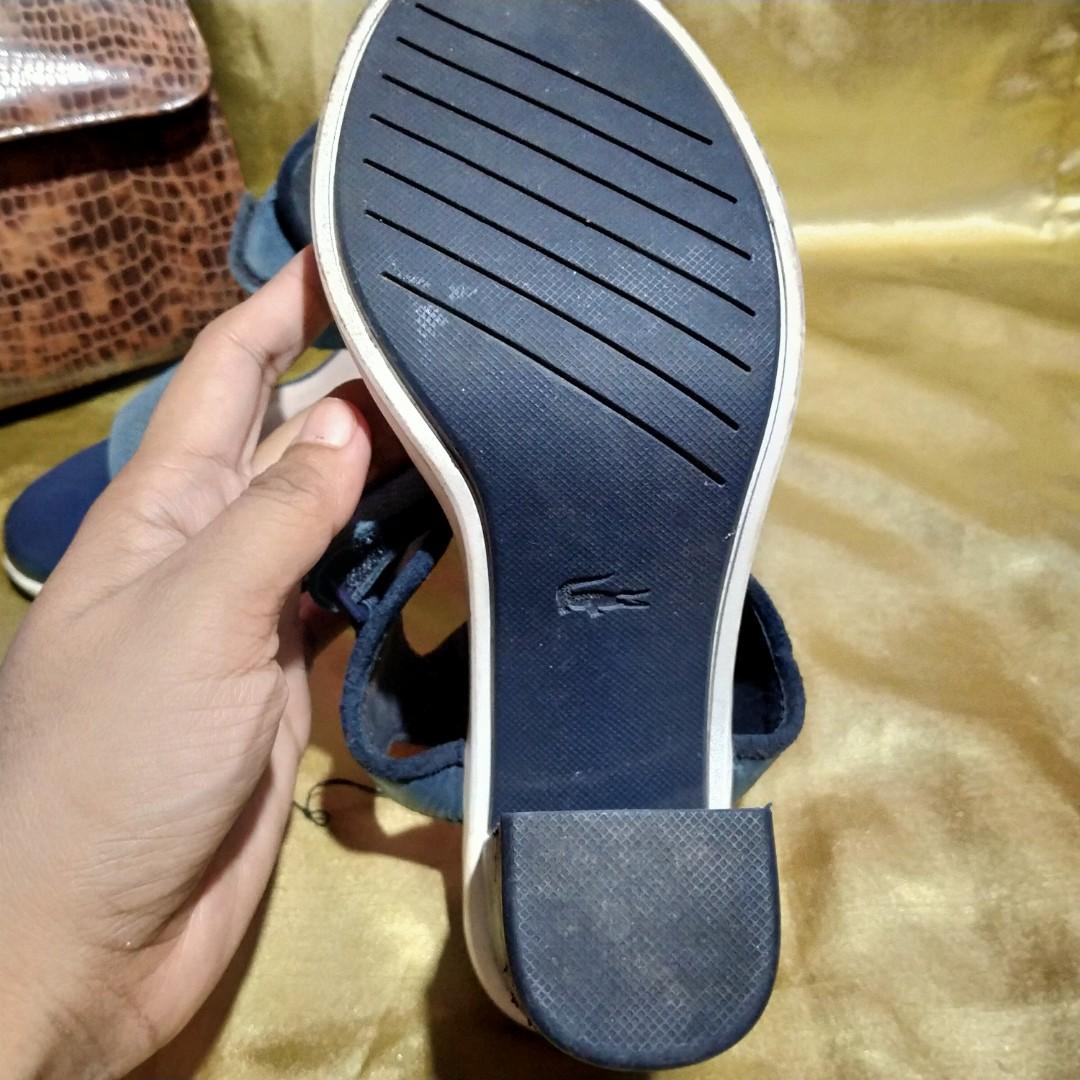 Lacoste Blue heels (Category: Heels) located in Cavite. Submitted by crizza16 (Listing ID 1000679186, Image 2). Description: with scratches sa heels. see pic for details. might get fixed by mr quickie..