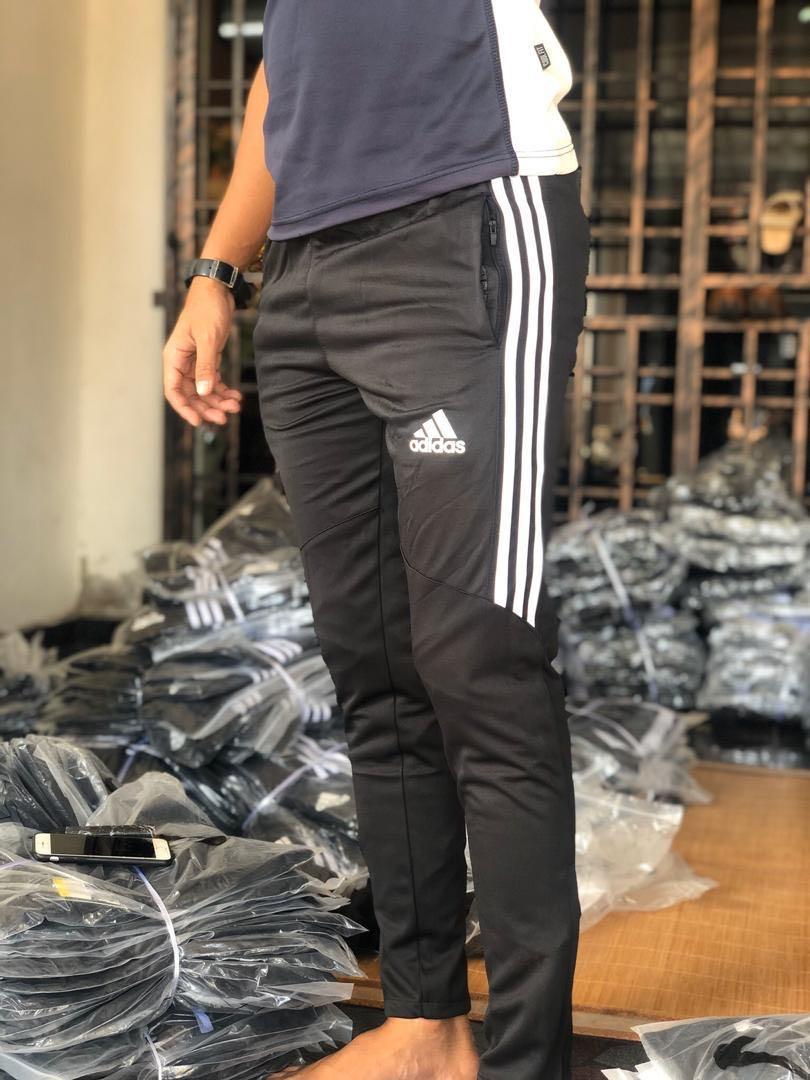 Half striped adidas joggers store