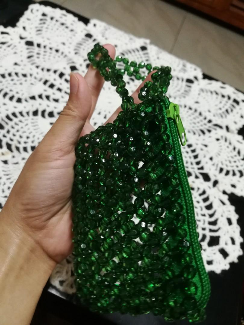 Beaded wallet with handle- Green (Category: Wallets & Card holders) located in Taguig. Submitted by glaigee (Listing ID 1001121695, Image 2). Description: A beaded wallet comes with handle that can be used as coin purse as well. Made of plastic beads and nylon with zipper. We accept MTO for minimum of 10 pcs for this style..