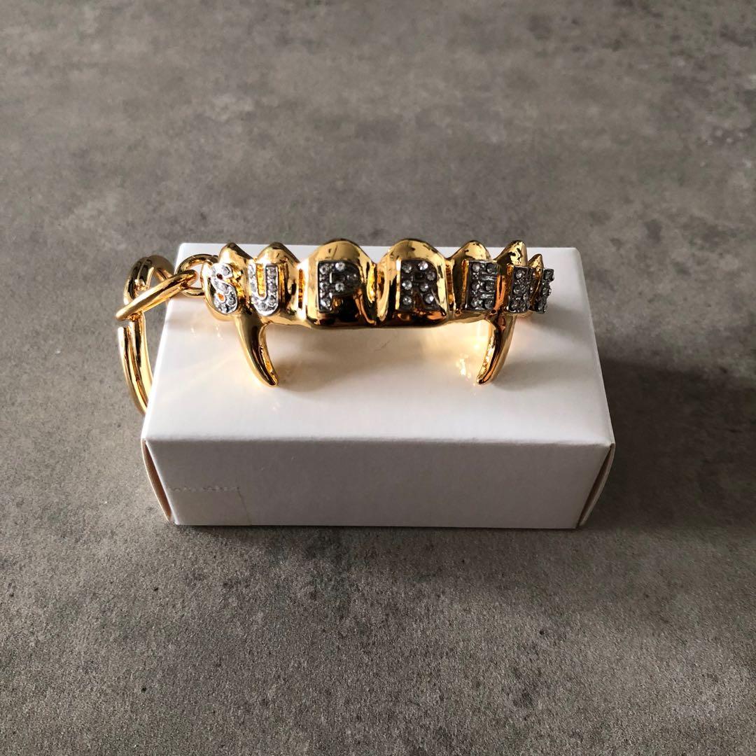 Supreme grills keychain Car Accessories Accessories on Carousell